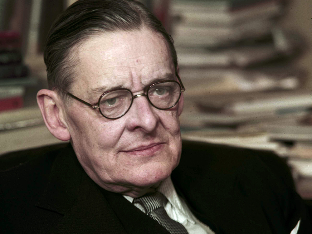 American poet T.S. Eliot is shown seated in his London Office on Jan. 19, 1956. (AP Photo)